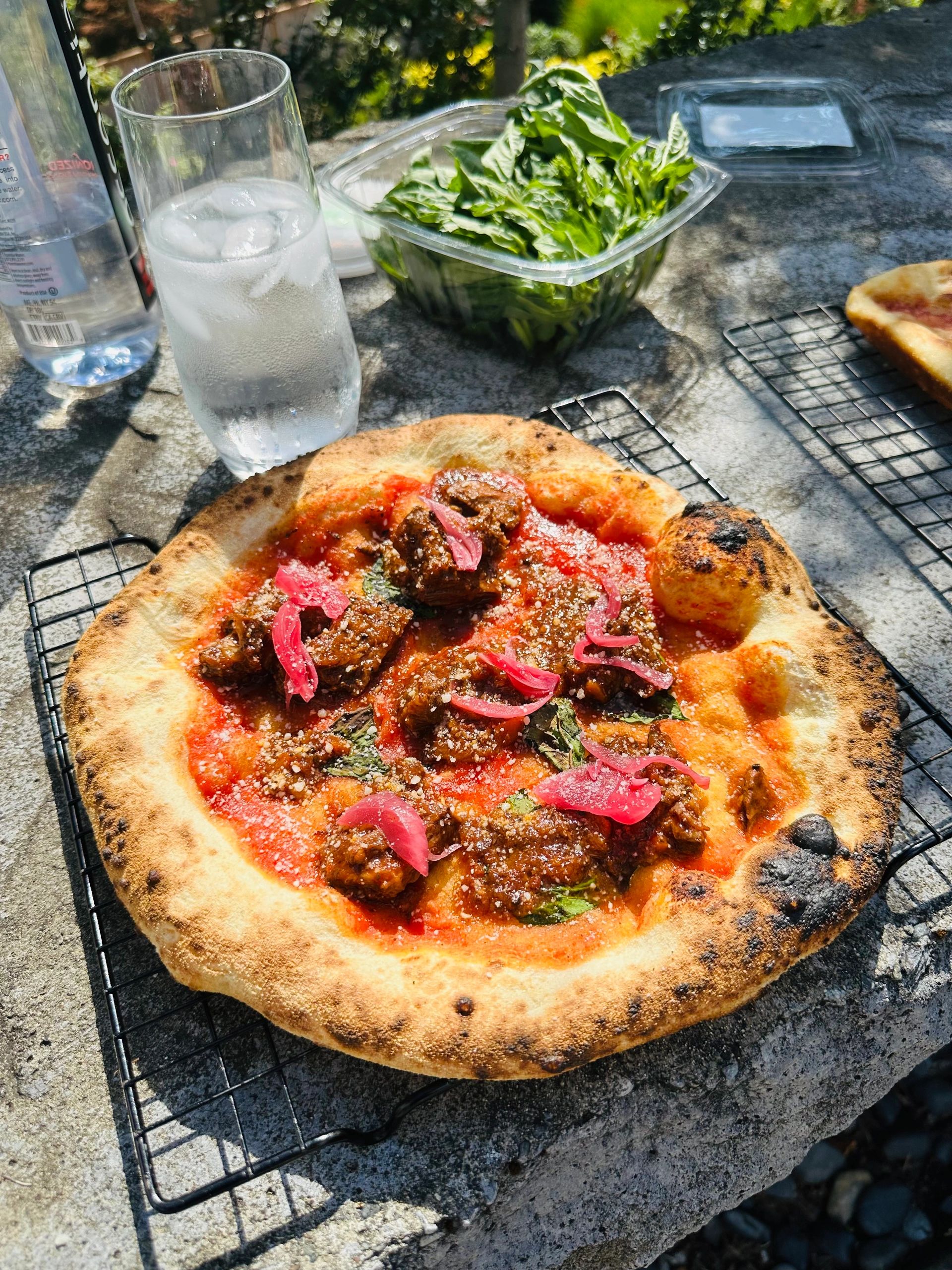 Sausage and pickled red onion pizza